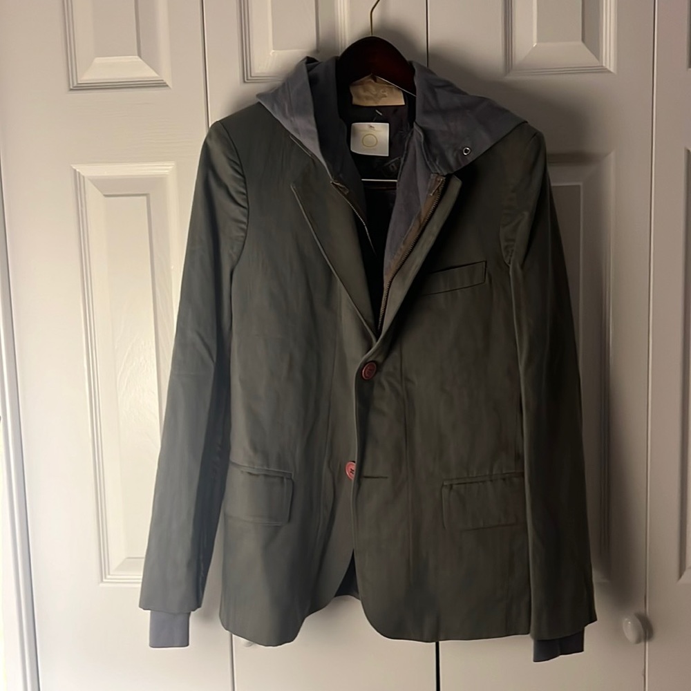 Super cool and unique hoodie suit jacket with pink buttons.